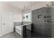 Modern bathroom featuring a glass shower and separate soaking tub at 837 Porches Way, Dacula, GA 30019