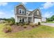 Charming two-story home with a well-manicured front lawn and welcoming porch at 837 Porches Way, Dacula, GA 30019
