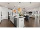 Island kitchen open to dining and living areas, great for entertaining at 837 Porches Way, Dacula, GA 30019