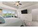 Serene main bedroom boasts tray ceilings, sofa, and neutral carpet at 837 Porches Way, Dacula, GA 30019