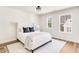 Bedroom featuring natural light, a stylish bed, and a minimalist design at 919 East Green Ln, Clarkston, GA 30021