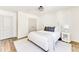 Cozy bedroom with neutral tones, a comfortable bed, and soft lighting, great for relaxing at 919 East Green Ln, Clarkston, GA 30021