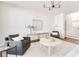 Bright living room with modern decor, hardwood floors, and an open floor plan at 919 East Green Ln, Clarkston, GA 30021