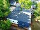 New construction home showcasing dark blue and white exterior and a dark roof at 210 Locust Ne St, Atlanta, GA 30317