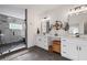 Updated bathroom features a walk-in shower, dual sinks, and lots of cabinet space at 210 Locust Ne St, Atlanta, GA 30317