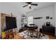Bedroom featuring an office area with decor, a black desk, and light hardwood flooring at 210 Locust Ne St, Atlanta, GA 30317