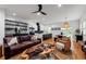 Spacious living room with an open layout, sleek kitchen, and contemporary decor, ideal for modern living at 210 Locust Ne St, Atlanta, GA 30317