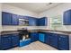 Updated kitchen featuring stylish cabinets, modern appliances, and light-colored flooring for a contemporary look at 7322 Bridlewood Ct, Jonesboro, GA 30236