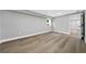 Finished basement with hardwood floors and a window at 130 Oakcliff Court, Atlanta, GA 30331