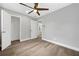 Neutral bedroom with ceiling fan and view to adjacent rooms at 130 Oakcliff Court, Atlanta, GA 30331