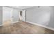 Bedroom boasts wood-look flooring, neutral paint, and natural light at 130 Oakcliff Court, Atlanta, GA 30331