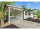 Spacious covered carport with access to the home, and black trim at 130 Oakcliff Court, Atlanta, GA 30331