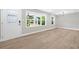 Bright living room filled with natural light, wood-look flooring, and neutral paint at 130 Oakcliff Court, Atlanta, GA 30331