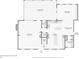 Floor plan of the first floor featuring a living room, kitchen, breakfast nook, and garage at 1922 Olde Village Run, Dunwoody, GA 30338