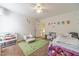 Bedroom with playful decor and carpeted flooring at 230 Wild Barley Way, Loganville, GA 30052