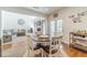 Open floor plan features living room and dining area at 230 Wild Barley Way, Loganville, GA 30052