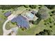 Aerial view featuring a pool, spa, and lush landscaping creating a private oasis around the backyard at 5010 Heardmont Trace Rd, Cumming, GA 30028