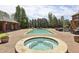 Backyard featuring a pool, hot tub, outdoor seating, and mature landscaping at 5010 Heardmont Trace Rd, Cumming, GA 30028