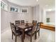 Dining room with seating for six; hardwood flooring on raised area at 5010 Heardmont Trace Rd, Cumming, GA 30028