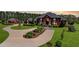 Beautiful exterior of the estate home with lush landscaping, a circular driveway and a three car garage at 5010 Heardmont Trace Rd, Cumming, GA 30028