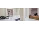 Home gym with an elliptical machine, exercise mat, and mirrored wall at 5010 Heardmont Trace Rd, Cumming, GA 30028