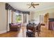 Bright office with bay window offering backyard views, wood floors, and custom valance at 5010 Heardmont Trace Rd, Cumming, GA 30028