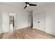 Bedroom featuring hardwood floors, two closets, a ceiling fan and access to the bathroom at 779-B Lynwood Se St, Atlanta, GA 30312