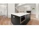 Kitchen island with microwave overlooks living room and staircase at 779-B Lynwood Se St, Atlanta, GA 30312