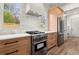 Chef's kitchen with stainless steel appliances and a bright, modern design at 779-B Lynwood Se St, Atlanta, GA 30312