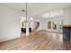 Bright open-concept living room featuring hardwood floors, fireplace, and natural light at 779-B Lynwood Se St, Atlanta, GA 30312