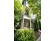 Charming two-story home with a cozy front porch and well-manicured landscaping in a suburban neighborhood at 986 Mauldin Se St, Atlanta, GA 30316