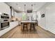 Modern kitchen featuring stainless steel appliances, a center island, and sleek cabinetry, designed for culinary enthusiasts at 986 Mauldin Se St, Atlanta, GA 30316
