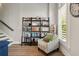 Reading nook with a comfortable chair, bookshelf, and bright window views at 986 Mauldin Se St, Atlanta, GA 30316