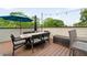 The rooftop deck has a large table and seating perfect for entertaining Gathering and friends at 986 Mauldin Se St, Atlanta, GA 30316