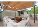 Enjoy the outdoors on the rooftop deck with firepit, tv and sunshade for optimal enjoyment at 986 Mauldin Se St, Atlanta, GA 30316