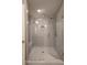 Contemporary bathroom features a glass enclosed shower with subway tile and overhead rain shower at 986 Mauldin Se St, Atlanta, GA 30316