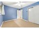 Spacious bedroom showcasing neutral walls, ceiling fan, and a closet with bi-fold doors providing ample storage space at 1111 Clairemont Ave # J6, Decatur, GA 30030