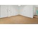 Clean living room with neutral carpet and walls, perfect for customization at 1111 Clairemont Ave # J6, Decatur, GA 30030