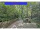 The community picnic table beside the pool and walking trails provides a great place to enjoy the outdoors at 1111 Clairemont Ave # J6, Decatur, GA 30030
