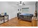 Cozy bedroom with hardwood floors, neutral decor, and ample closet space at 115 Pine Tree Dr, Fayetteville, GA 30214