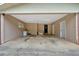 Spacious garage with ample storage space, lighting, and a functional layout at 115 Pine Tree Dr, Fayetteville, GA 30214