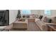 Comfortable living room features a large sectional sofa, soft rug, and neutral color palette at 115 Pine Tree Dr, Fayetteville, GA 30214