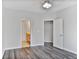 Bedroom featuring hard surface floors and doorways to closet and bathroom at 1150 Collier Nw Rd # 1N, Atlanta, GA 30318