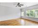 Spacious bedroom with hardwood floors, a ceiling fan, and plenty of natural light at 1150 Collier Nw Rd # 1N, Atlanta, GA 30318