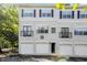 Charming townhome with a three-car garage and classic architectural details at 1150 Collier Nw Rd # 1N, Atlanta, GA 30318