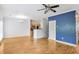 Open-concept living space with hardwood floors connecting the living and kitchen areas at 1150 Collier Nw Rd # 1N, Atlanta, GA 30318