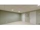 A finished basement offers a blank canvas with neutral paint, carpet, and essential utilities at 1180 Oxford Dr, Conyers, GA 30013