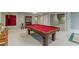 This finished basement features carpet and a pool table at 1180 Oxford Dr, Conyers, GA 30013