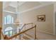 Elegant foyer with high ceilings, staircase, decorative chandelier, and natural light at 1180 Oxford Dr, Conyers, GA 30013