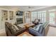 Inviting living room with built-in bookshelves, fireplace, and ample seating at 1180 Oxford Dr, Conyers, GA 30013